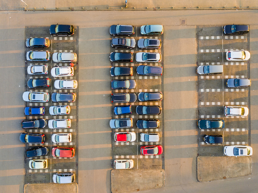 cars parked in a big parking lot