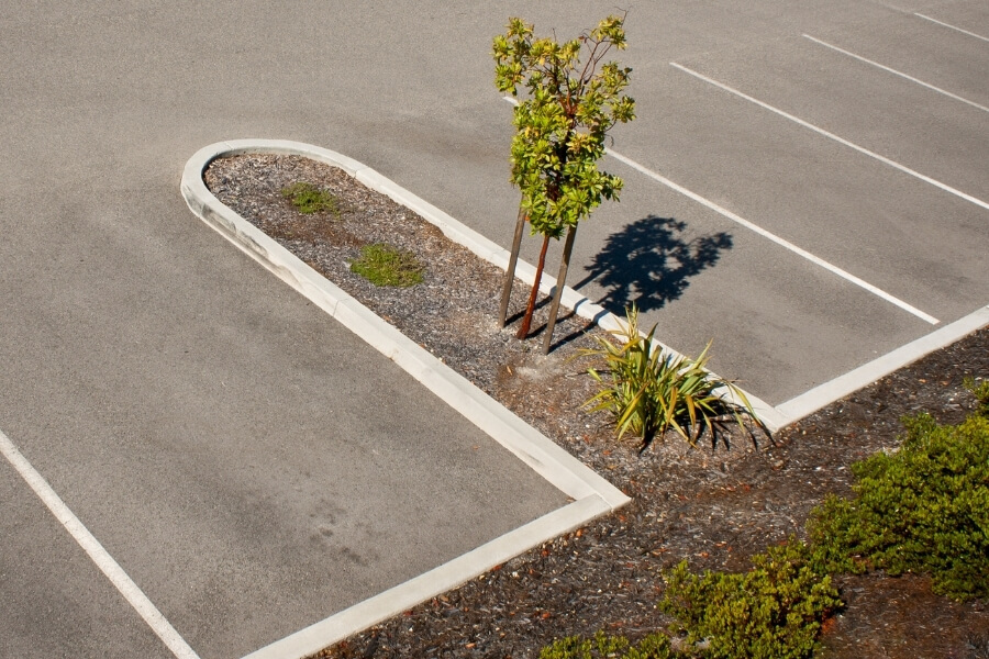 Commercial Parking Lot Curb Extruders Limitless Paving & Concrete